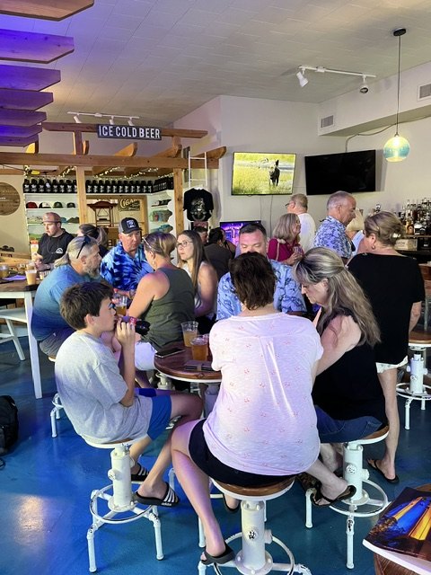 Friends gathered around a table for games and conversation
